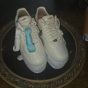 Nike Cream Athletic Shoes with Blue and White Laces